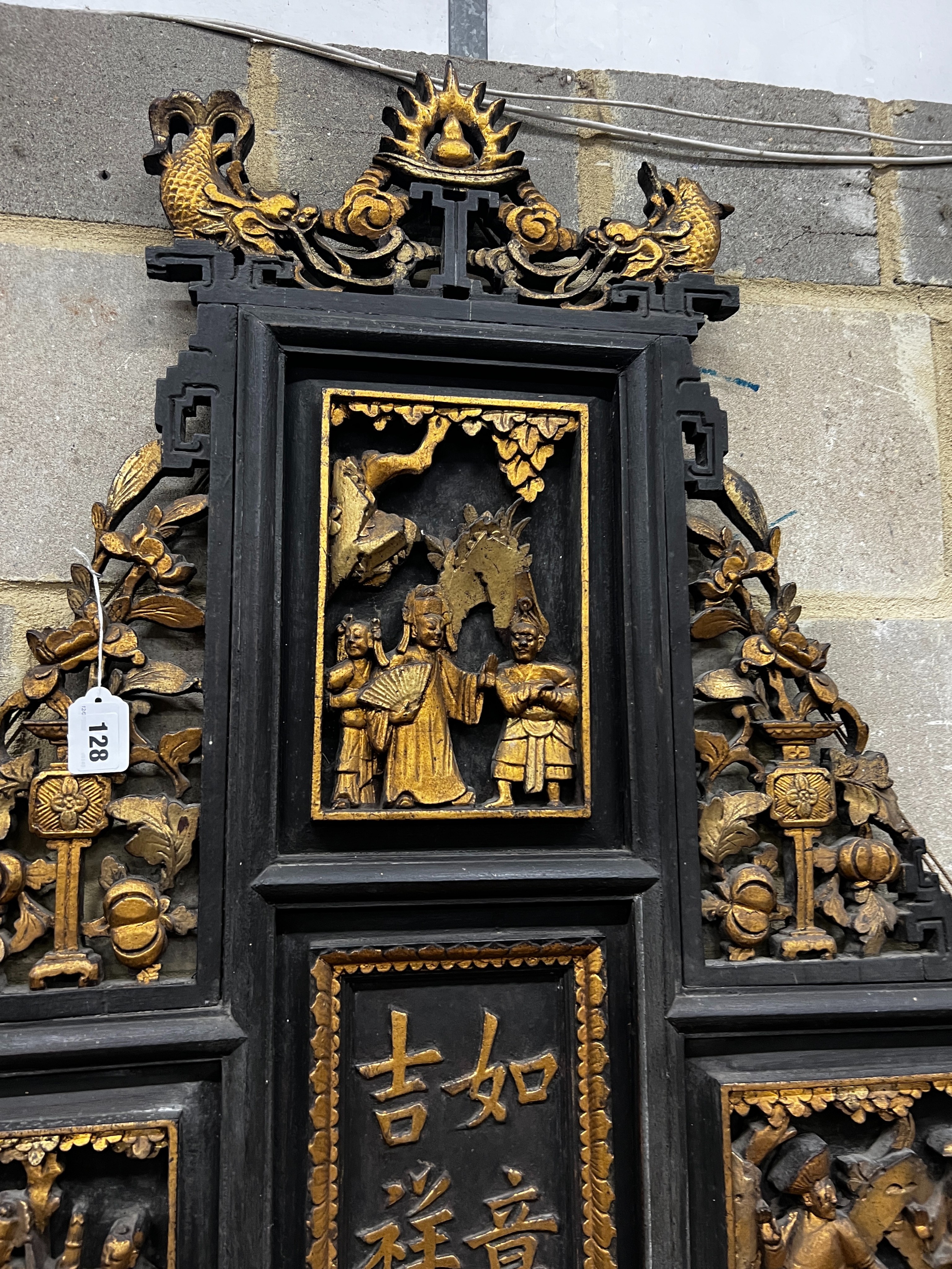 A Chinese carved parcel gilt lacquer wall plaque, width 140cm, height 107cm